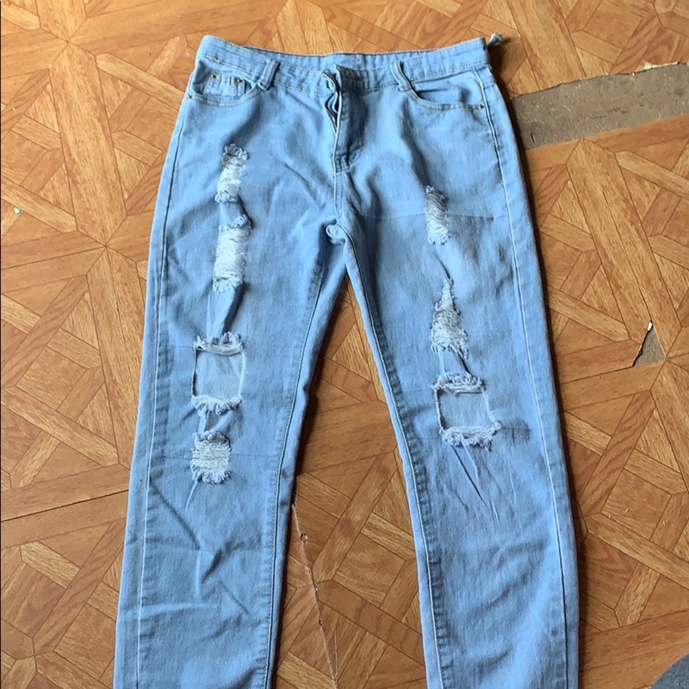Ripped light blue jeans